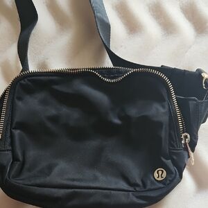 lululemon athletica Black Crossbody Bag with Gold Accents